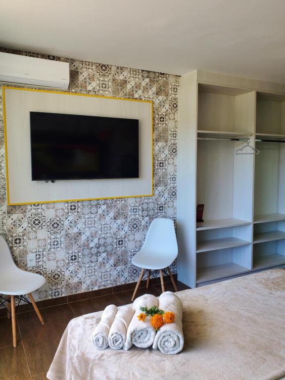 TV a/nebo společenská místnost v ubytování Villa Terragona