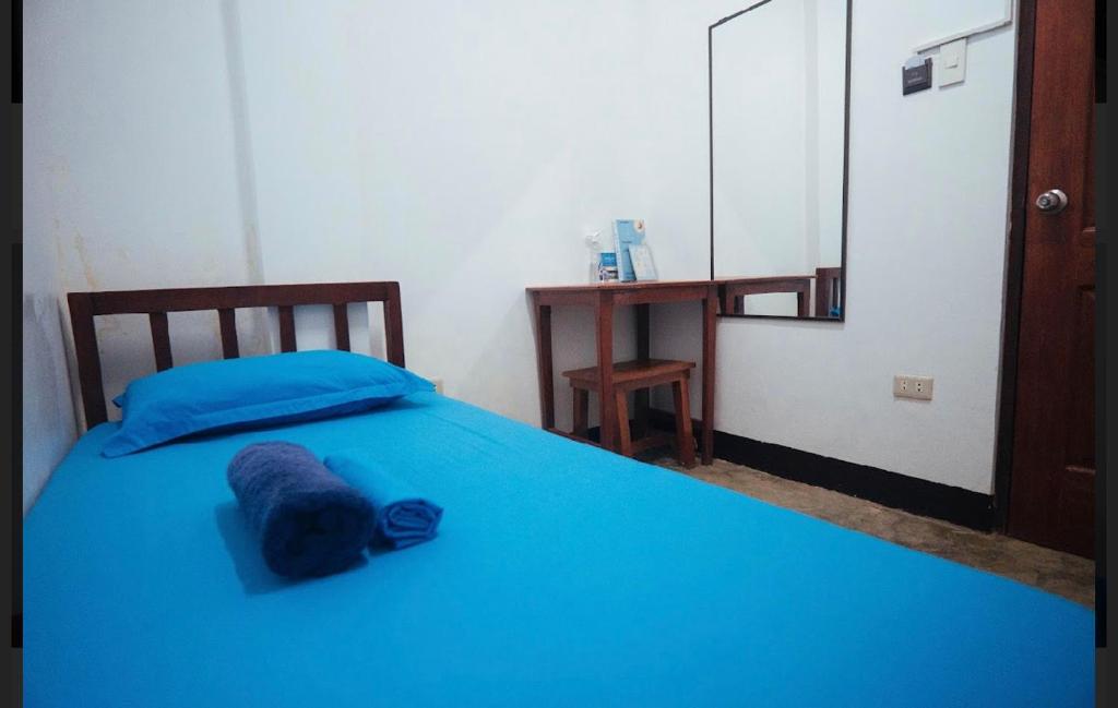 Postel nebo postele na pokoji v ubytování Tres Islas Hostel