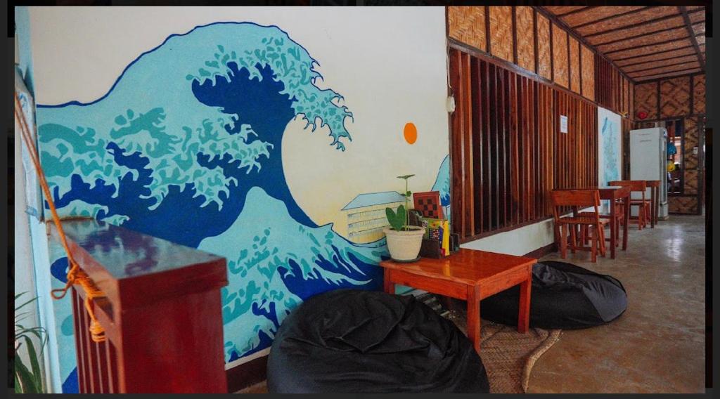 Posezení v ubytování Tres Islas Hostel
