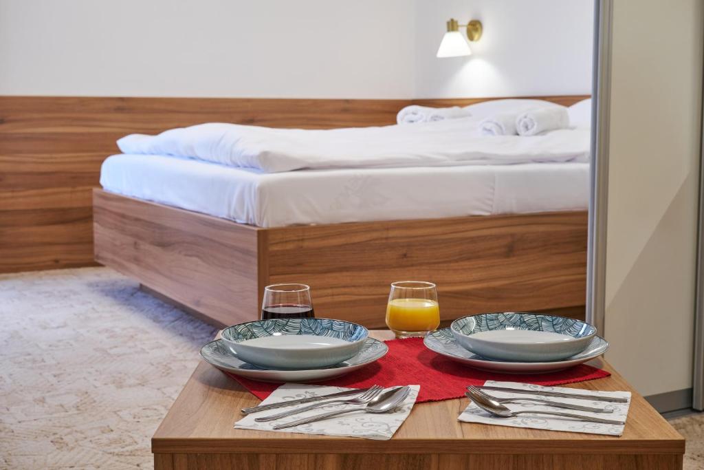 Postel nebo postele na pokoji v ubytování Spa & wellness Villa Garetov Konak