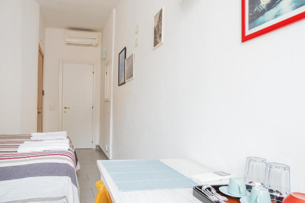Postel nebo postele na pokoji v ubytování Banchi