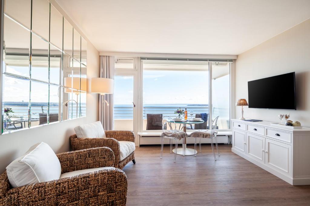 TV a/nebo společenská místnost v ubytování Meerblick Apartment 110