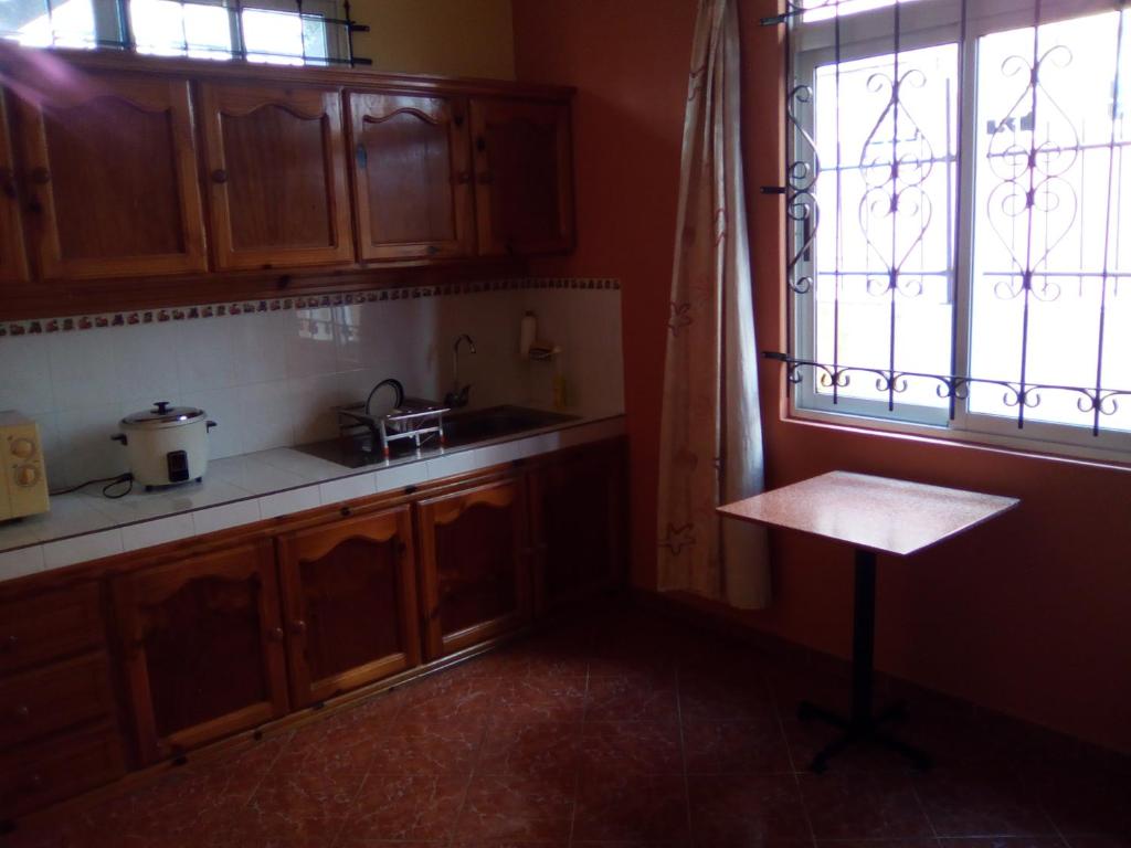 Virtuvė arba virtuvėlė apgyvendinimo įstaigoje Villa Harmonie