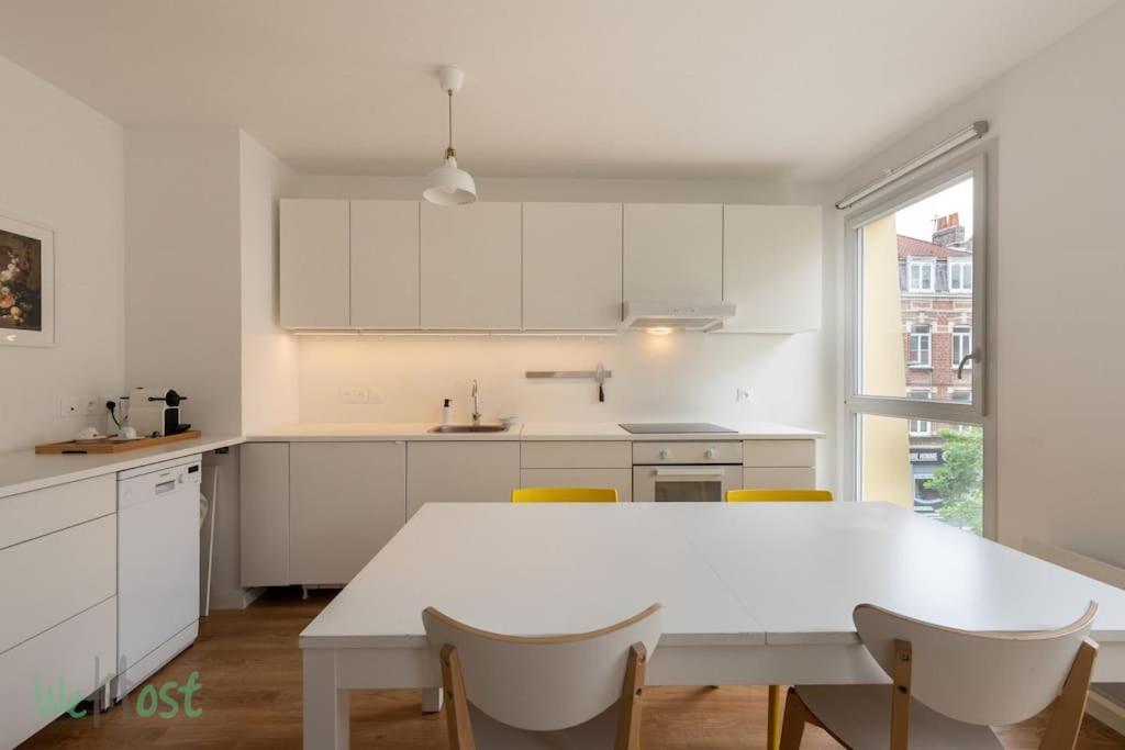 Kuchyňa alebo kuchynka v ubytovaní Appartement lumineux et récent - Wazemmes