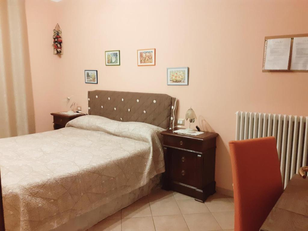 Postel nebo postele na pokoji v ubytování La Casa Più Sù