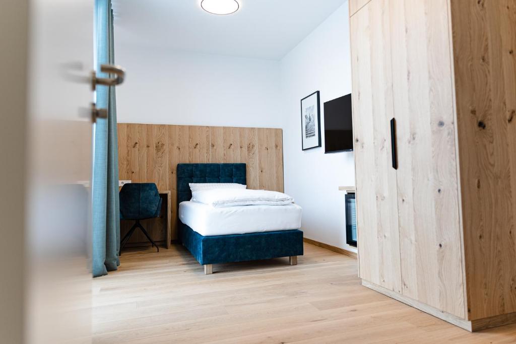 Postel nebo postele na pokoji v ubytování Boardinghouse Plattling