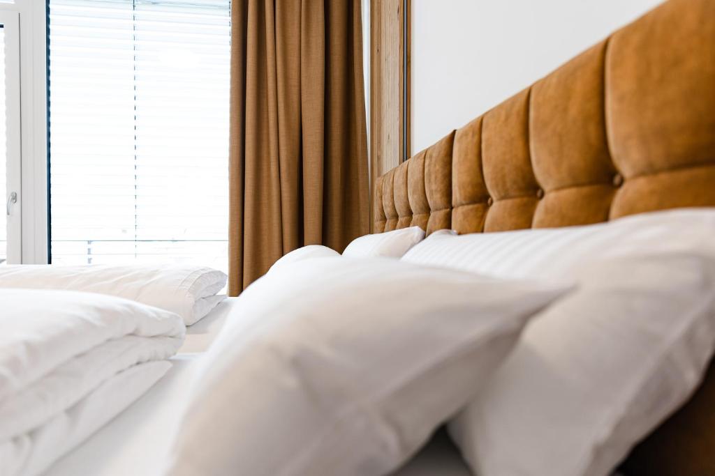 Postel nebo postele na pokoji v ubytování Boardinghouse Plattling