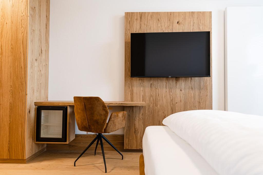 TV a/nebo společenská místnost v ubytování Boardinghouse Plattling