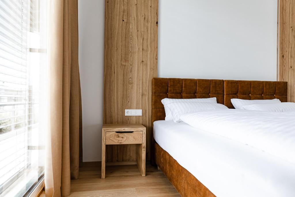 Postel nebo postele na pokoji v ubytování Boardinghouse Plattling