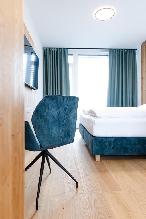 Postel nebo postele na pokoji v ubytování Boardinghouse Plattling