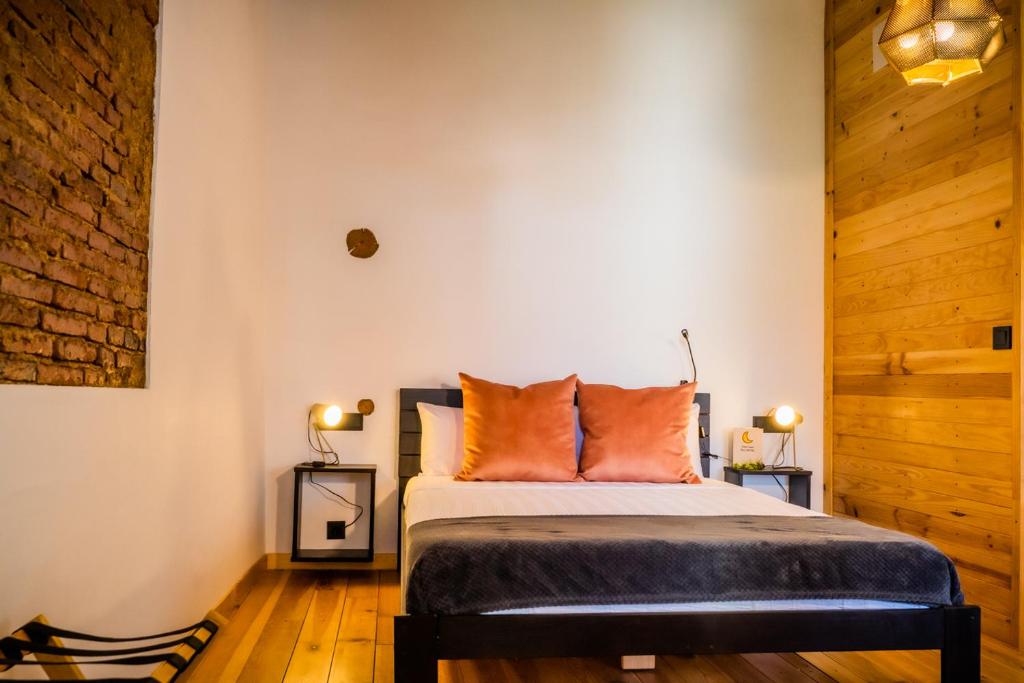 Postel nebo postele na pokoji v ubytování Hotel Casa Luna