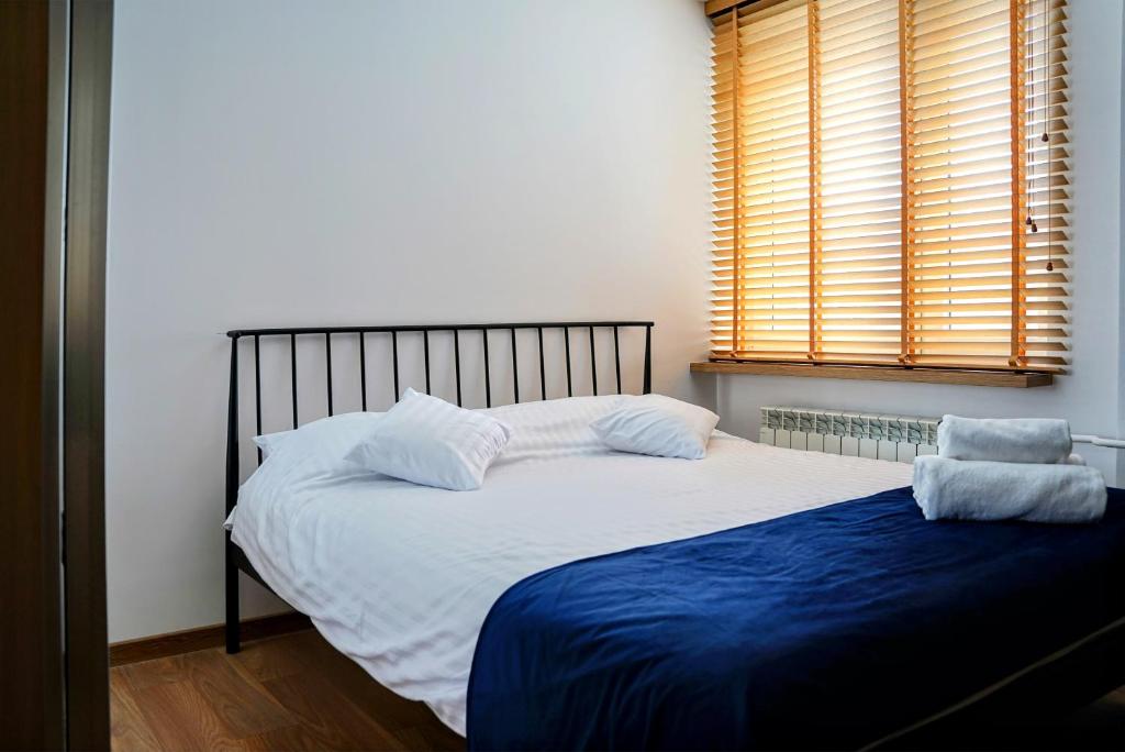 Postel nebo postele na pokoji v ubytování Apartament 914