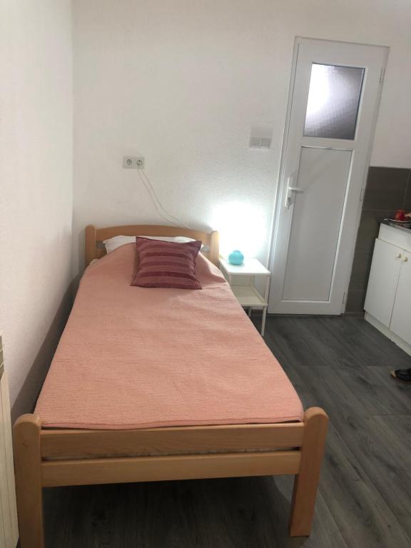 Postel nebo postele na pokoji v ubytování Miki