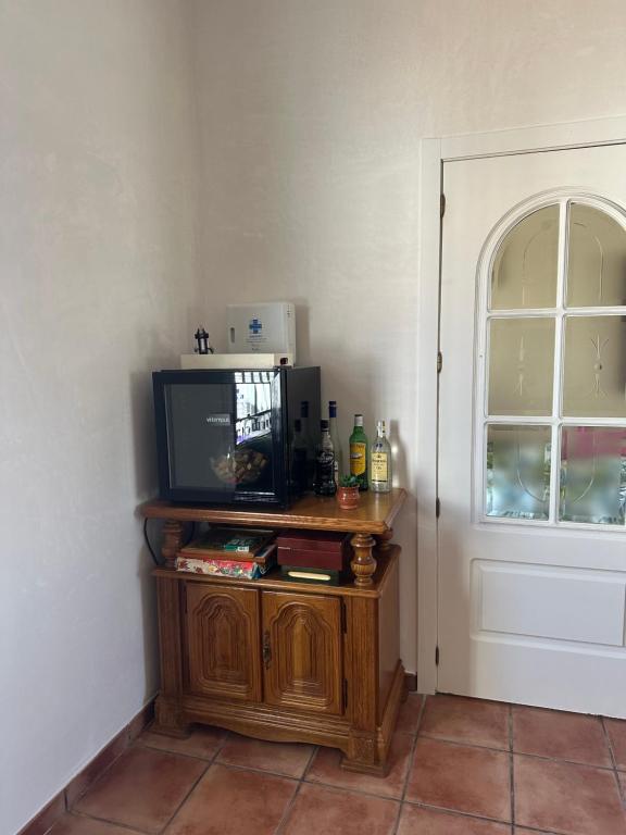 TV a/nebo společenská místnost v ubytování Casa Rural El Limonero