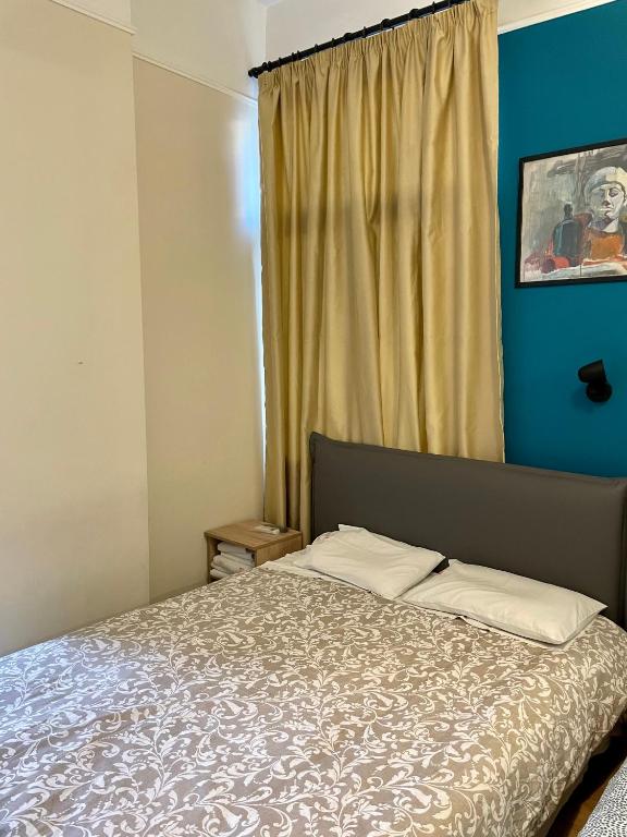 Postel nebo postele na pokoji v ubytování Hotel Kastoria