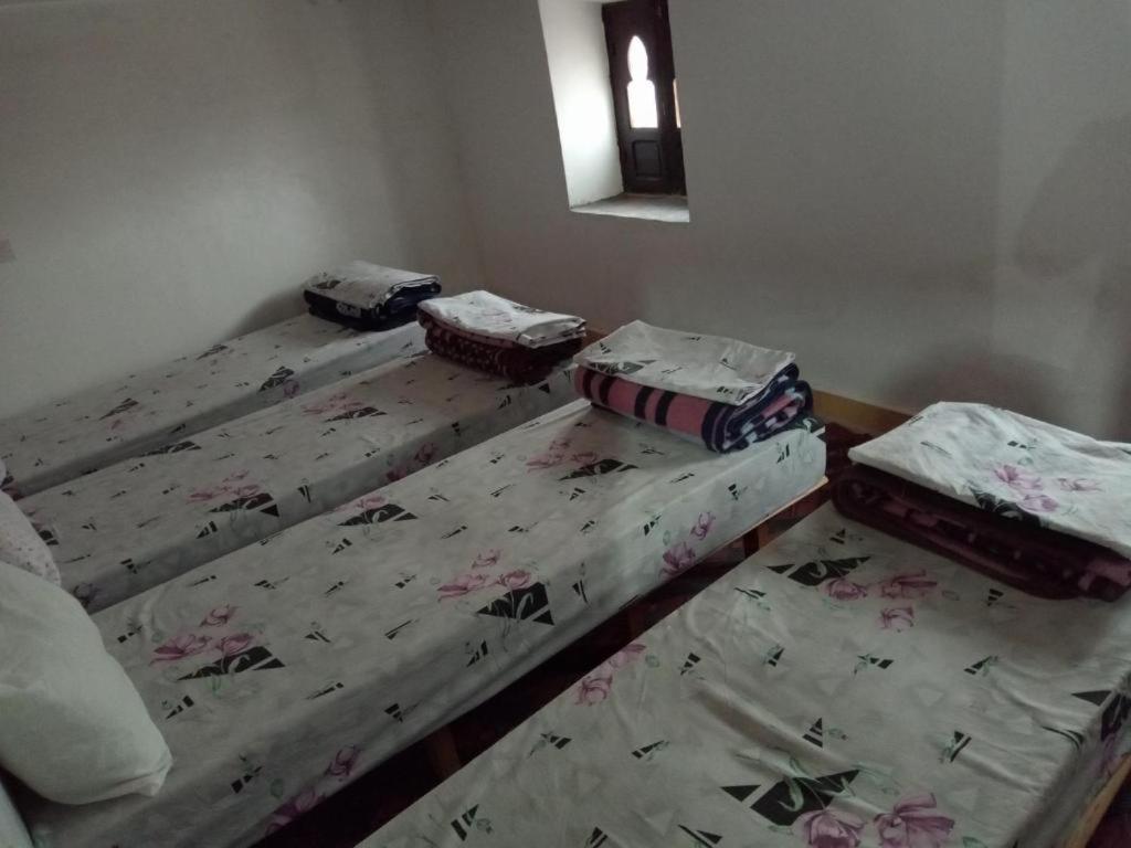 Postel nebo postele na pokoji v ubytování Gîte Assafar