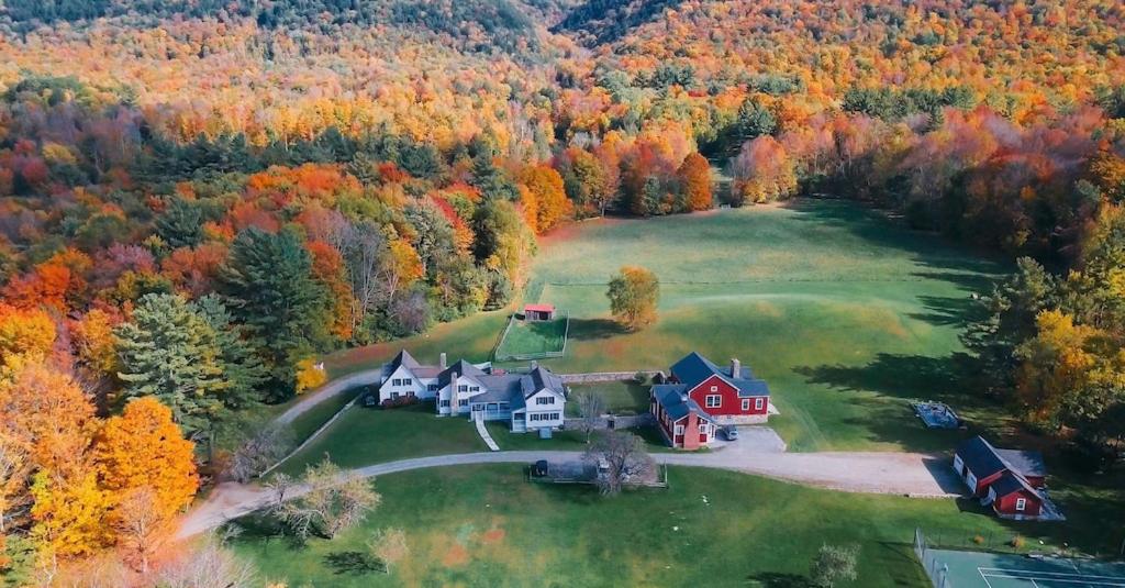 an aerial view of a home in the woods at Historic Renovated Barn at Boorn Brook Farm - Manchester Vermont in Manchester Center