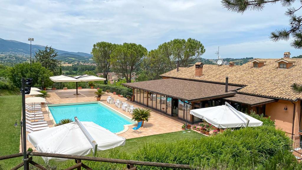 The swimming pool at or close to Hotel La Fattoria