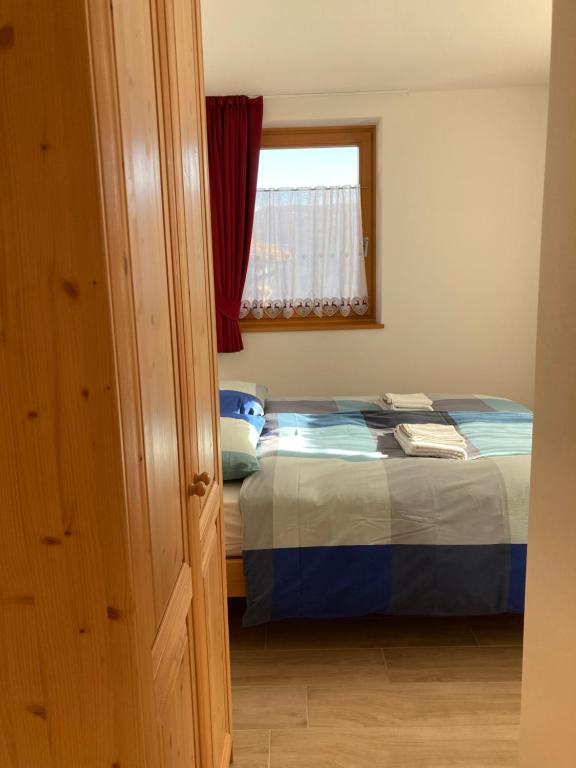 Postel nebo postele na pokoji v ubytování IL moleta Affittacamere