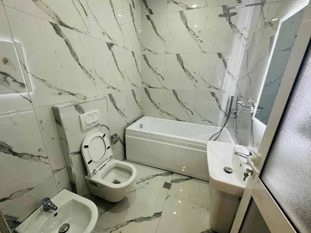Kúpeľňa v ubytovaní UJVARA HOTEL