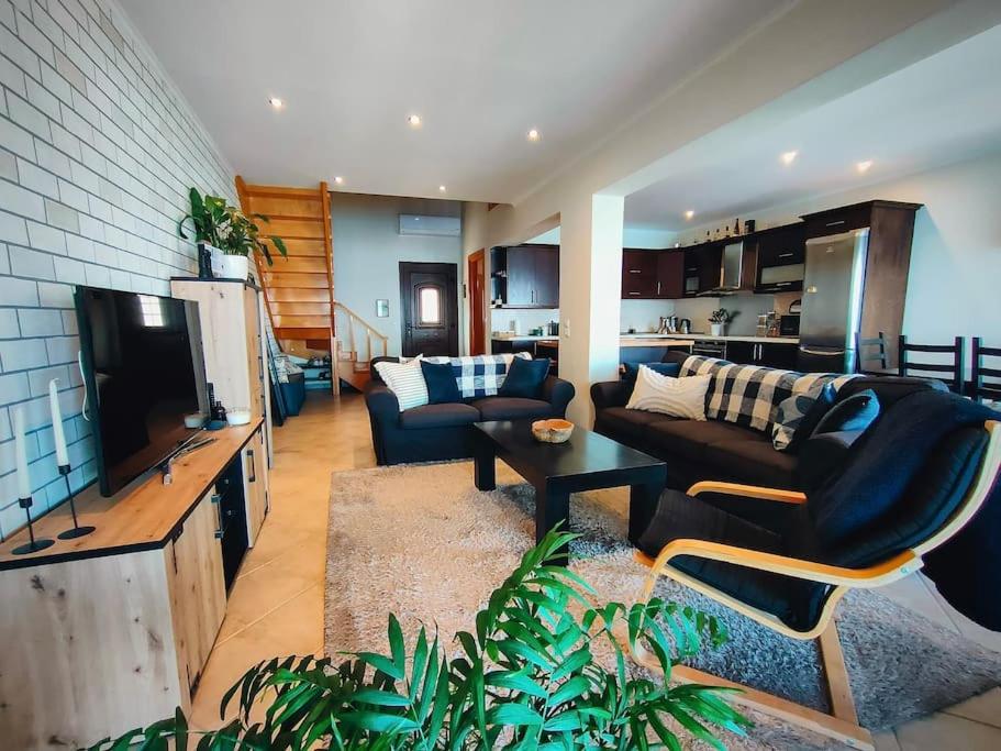 A television and/or entertainment centre at Barbati balcony view