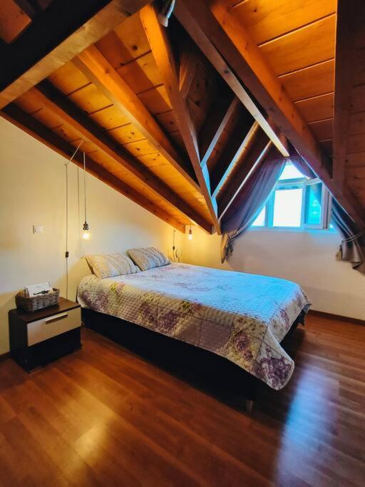 A bed or beds in a room at Barbati balcony view