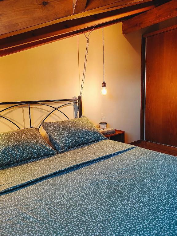 A bed or beds in a room at Barbati balcony view