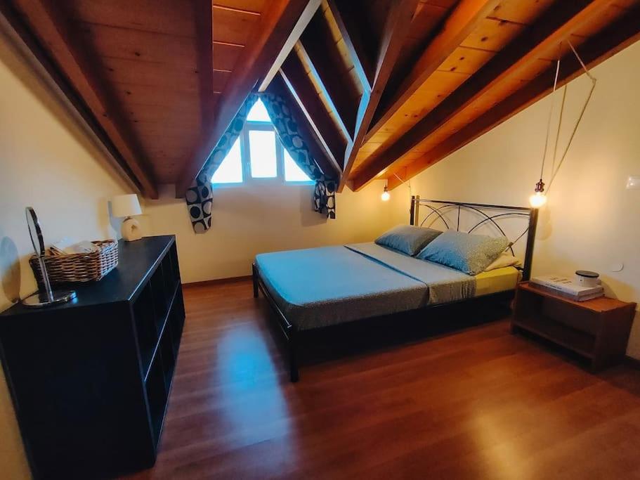 A bed or beds in a room at Barbati balcony view