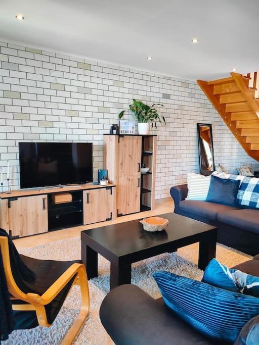 A television and/or entertainment centre at Barbati balcony view