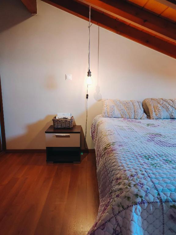 A bed or beds in a room at Barbati balcony view