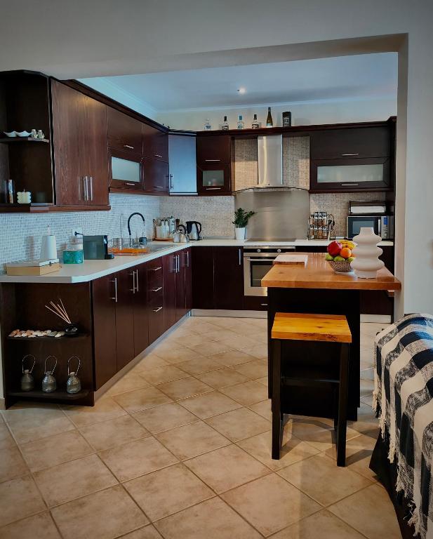 A kitchen or kitchenette at Barbati balcony view