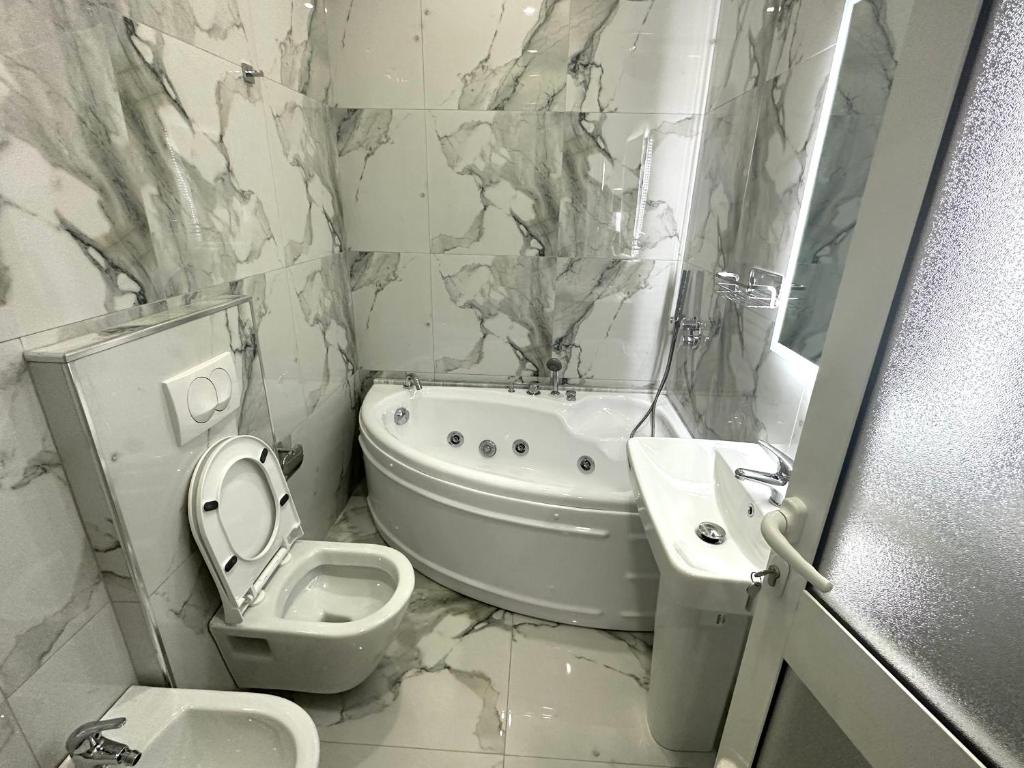 Kúpeľňa v ubytovaní UJVARA HOTEL