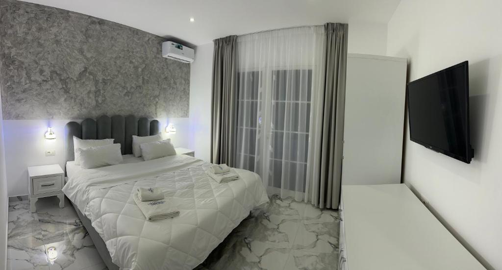 Posteľ alebo postele v izbe v ubytovaní UJVARA HOTEL