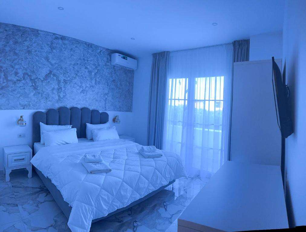Posteľ alebo postele v izbe v ubytovaní UJVARA HOTEL