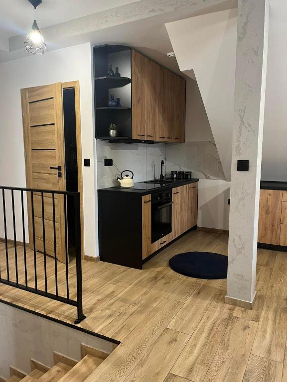 Kuchyňa alebo kuchynka v ubytovaní Apartamenty na Blichu - Noclegi Energylandia Zator