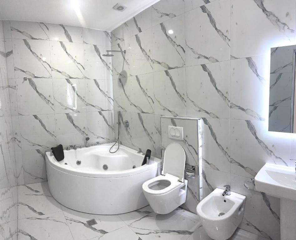 Kúpeľňa v ubytovaní UJVARA HOTEL