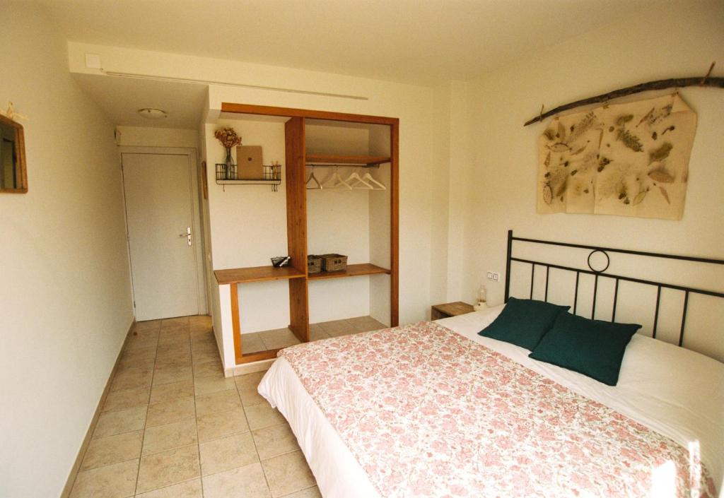 Postel nebo postele na pokoji v ubytování Hostal de l'Aigua