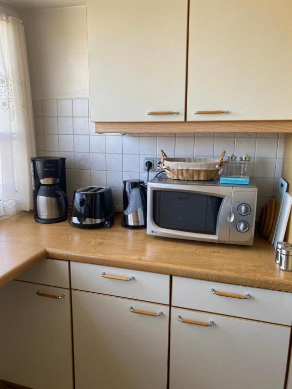 Kuchyň nebo kuchyňský kout v ubytování Ostsee Appartement Grömitz - Haus Ihlow