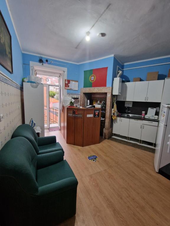 Kuchyň nebo kuchyňský kout v ubytování Alojamento Local Private Accommodation