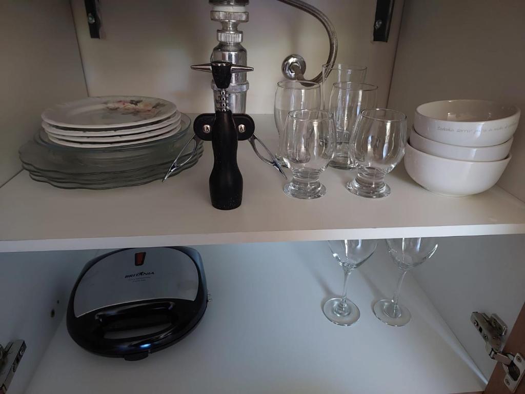 Kuchyň nebo kuchyňský kout v ubytování Flat Hotel Pedra Azul