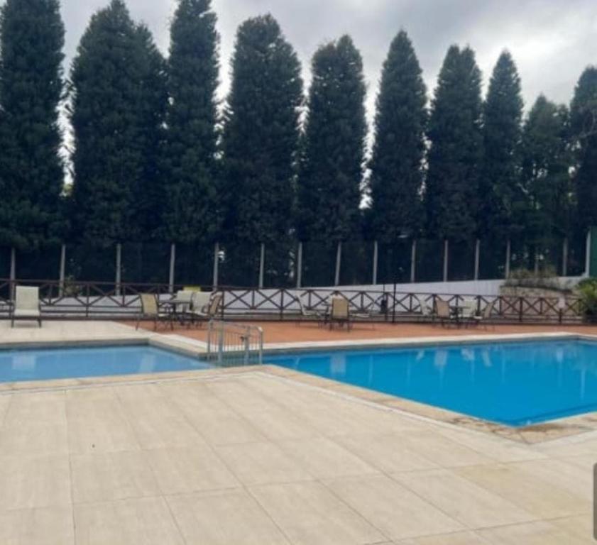 Bazén v ubytování Flat Hotel Pedra Azul nebo v jeho okolí