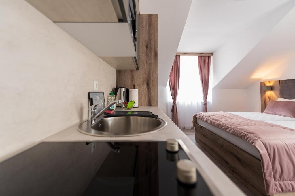 Postel nebo postele na pokoji v ubytování Casa ARTEE Free Parking