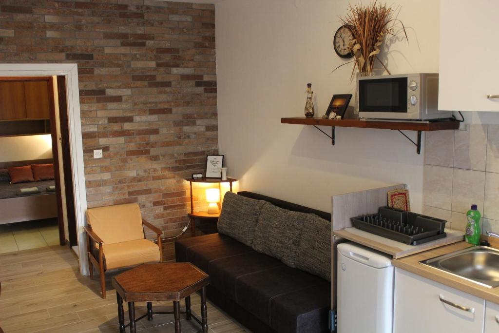 Kuchyň nebo kuchyňský kout v ubytování Apartments & Rooms Tea