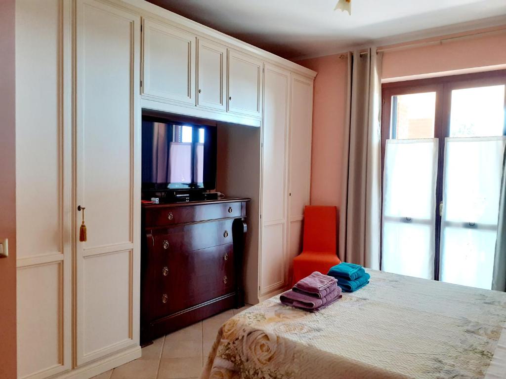 Postel nebo postele na pokoji v ubytování La Casa Più Sù