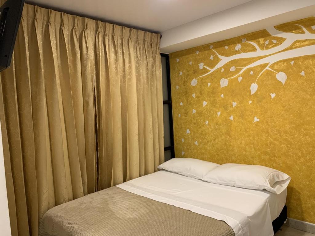 Voodi või voodid majutusasutuse Hostel Casa Zambrano toas