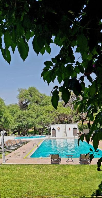 Bazén v ubytování Hotel Hacienda Taboada (Aguas Termales) nebo v jeho okolí