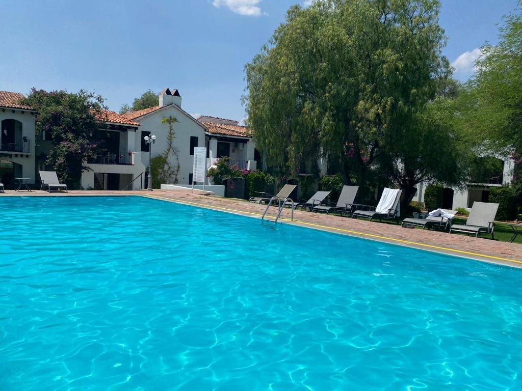 Bazén v ubytování Hotel Hacienda Taboada (Aguas Termales) nebo v jeho okolí