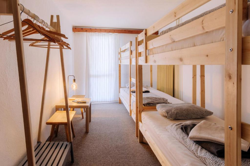 Postel nebo postele na pokoji v ubytování Chata pod Sedlom Čertovica