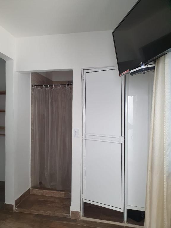 TV a/nebo společenská místnost v ubytování Hotel Prestige