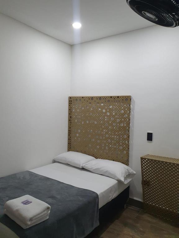 Postel nebo postele na pokoji v ubytování Hotel Prestige